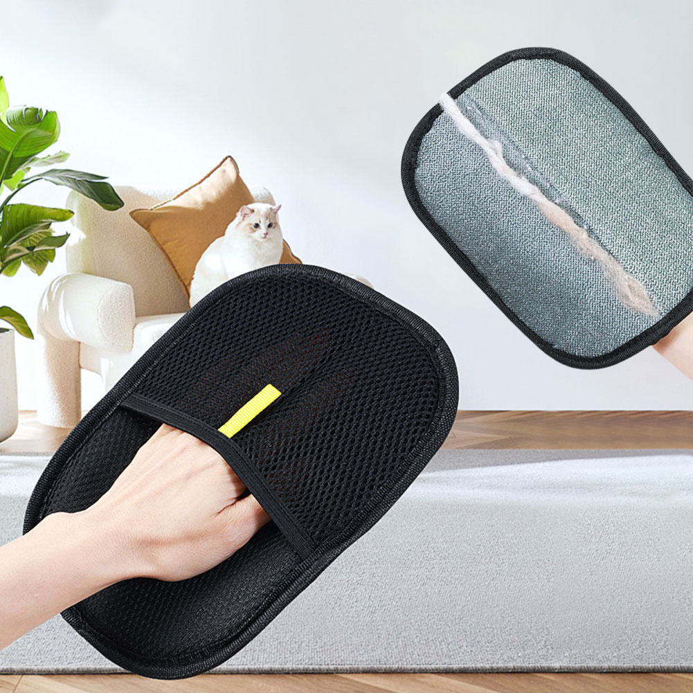 Hair removal mitt used gently on a dog’s coat.