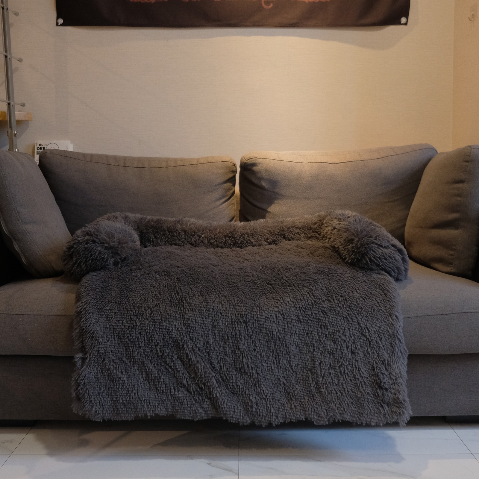 Gray portable dog bed viewed from above.